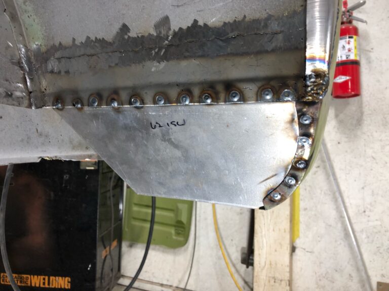 1962 15 window deluxe vw bus wheel well replacement and metal work silver lining auto restoration oregon
