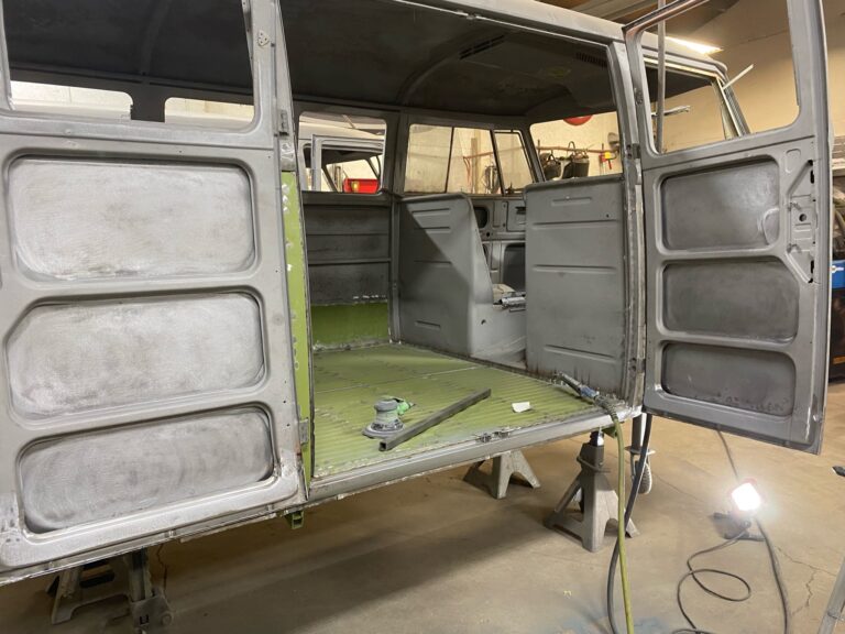 1962 15 window deluxe vw bus wheel well replacement and metal work silver lining auto restoration oregon