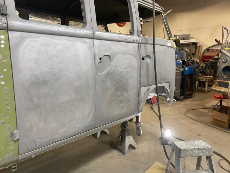 1962 15 window deluxe vw bus wheel well replacement and metal work silver lining auto restoration oregon