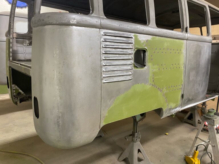 1962 15 window deluxe vw bus wheel well replacement and metal work silver lining auto restoration oregon