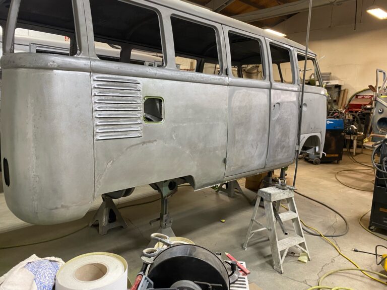 1962 15 window deluxe vw bus wheel well replacement and metal work silver lining auto restoration oregon