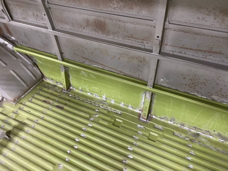 1962 15 window deluxe vw bus wheel well replacement and metal work silver lining auto restoration oregon