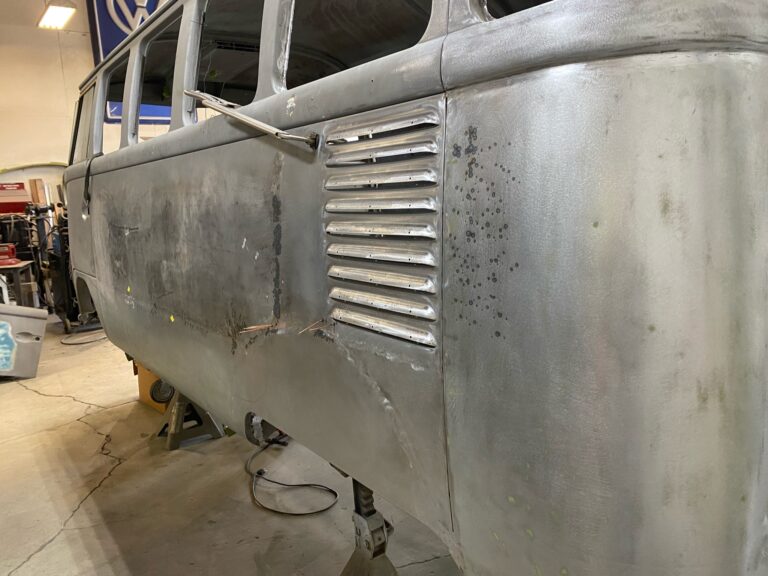 1962 15 window deluxe vw bus wheel well replacement and metal work silver lining auto restoration oregon