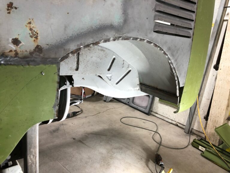 1962 15 window deluxe vw bus wheel well replacement and metal work silver lining auto restoration oregon