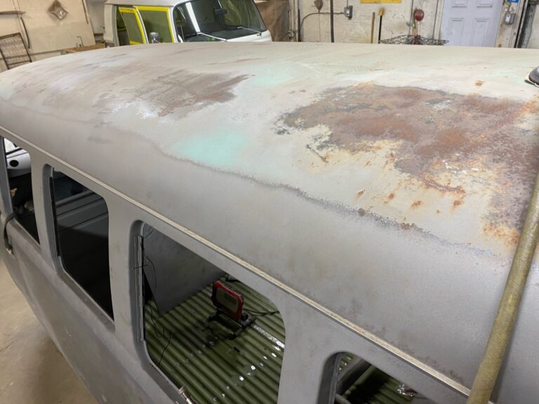1962 15 window deluxe vw bus wheel well replacement and metal work silver lining auto restoration oregon