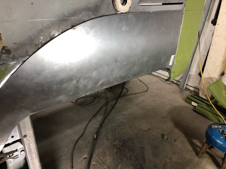 1962 15 window deluxe vw bus wheel well replacement and metal work silver lining auto restoration oregon