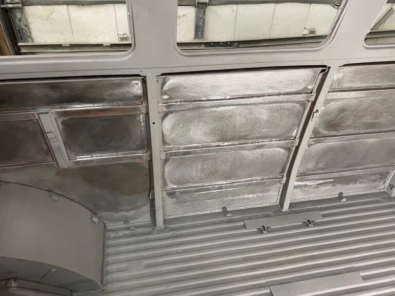 1954 barndoor 23 window deluxe vw bus final metal details before primer silver lining auto restoration oregon