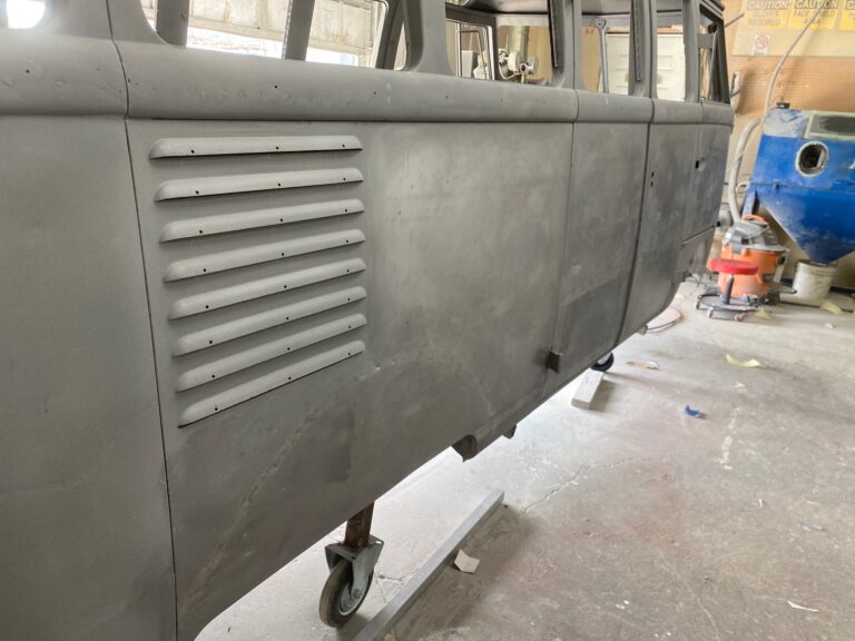 1954 barndoor 23 window deluxe vw bus final metal details before primer silver lining auto restoration oregon