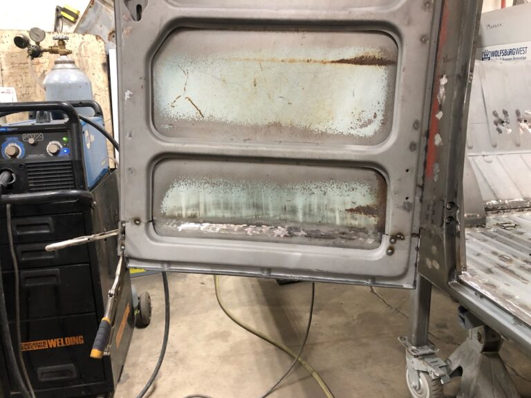 1963 23 window deluxe vw bus cargo door rust repair silver lining auto restoration oregon