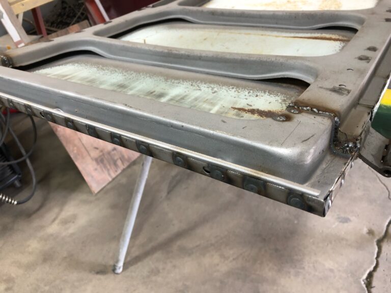 1963 23 window deluxe vw bus cargo door rust repair silver lining auto restoration oregon