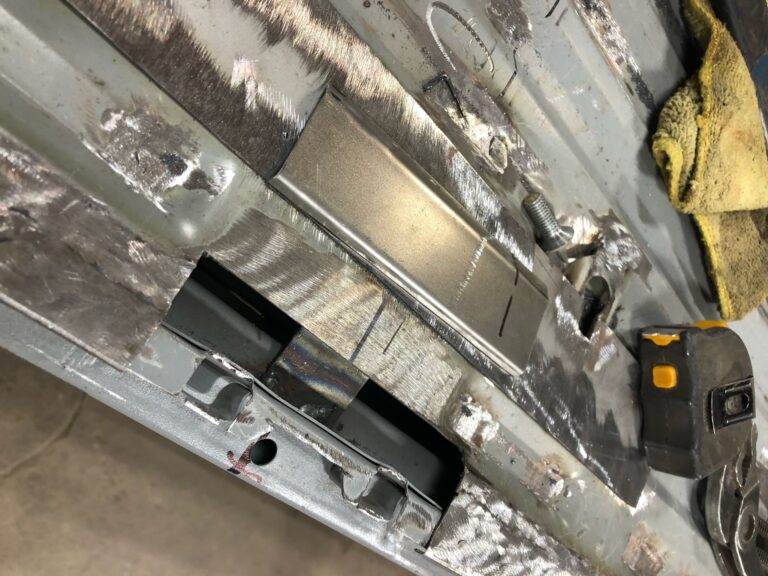 1963 23 window deluxe vw bus front door rust repair silver lining auto restoration oregon