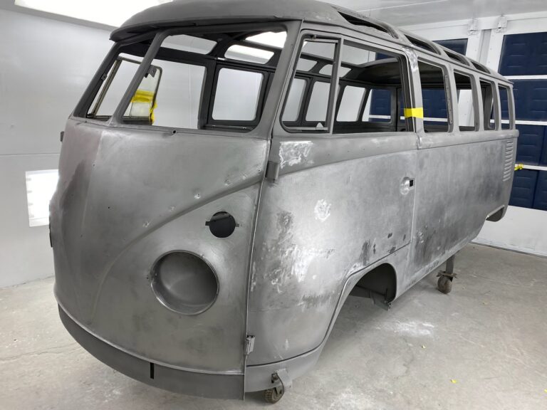 1963 23 window deluxe vw bus in bare metal after metal work silver lining auto restoration