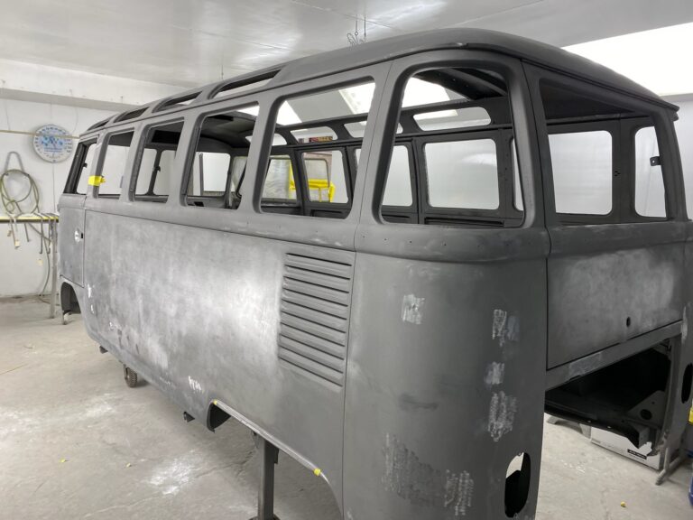 1963 23 window deluxe vw bus in bare metal after metal work silver lining auto restoration