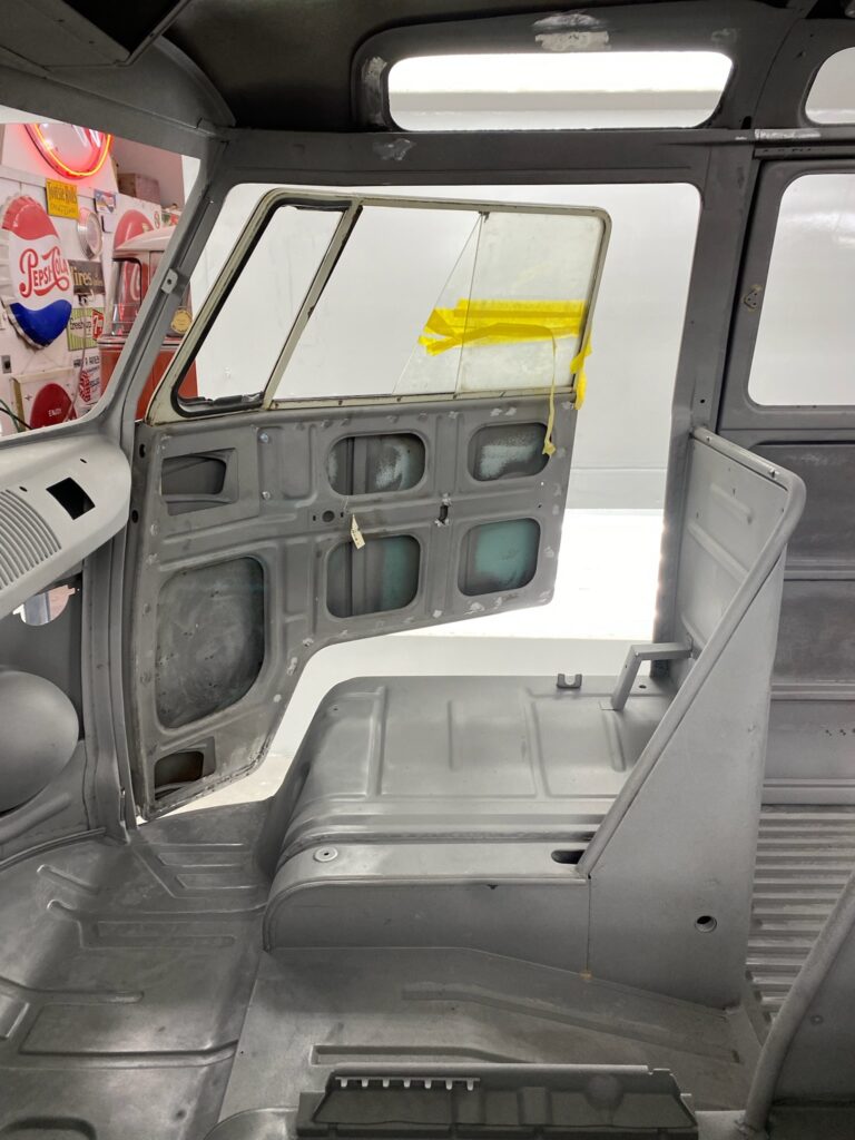 1963 23 window deluxe vw bus in bare metal after metal work silver lining auto restoration