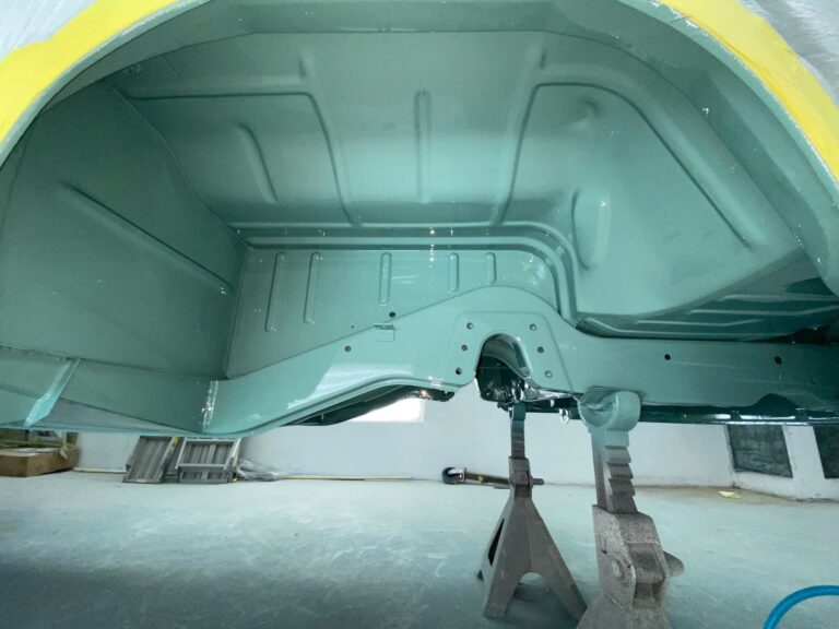 1963 23 window deluxe vw bus under body in paint silver lining auto restoration oregon