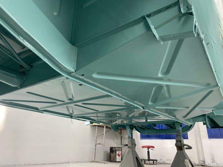 1963 23 window deluxe vw bus under body in paint silver lining auto restoration oregon