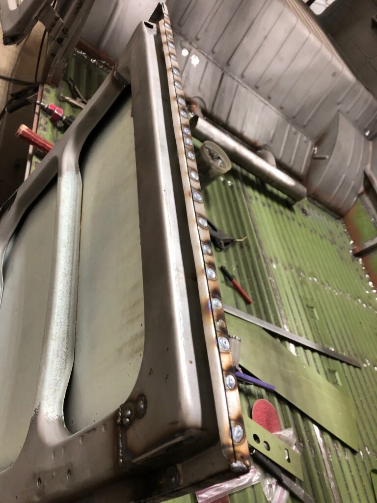 1965 21 window deluxe vw bus cargo door rust repair silver lining auto restoration oregon