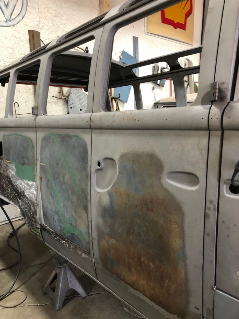 1965 21 window deluxe vw bus cargo door rust repair silver lining auto restoration oregon