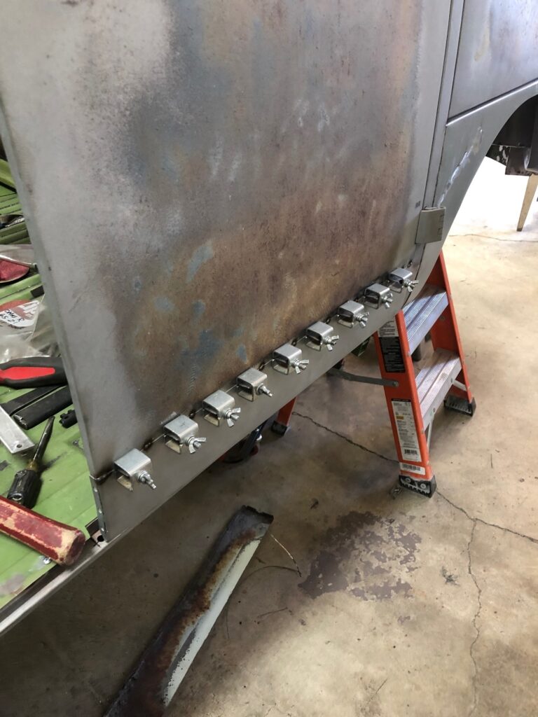 1965 21 window deluxe vw bus cargo door rust repair silver lining auto restoration oregon