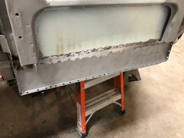 1965 21 window deluxe vw bus cargo door rust repair silver lining auto restoration oregon