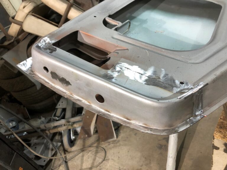 1965 21 window deluxe vw bus front door rust repair silver lining auto restoration oregon