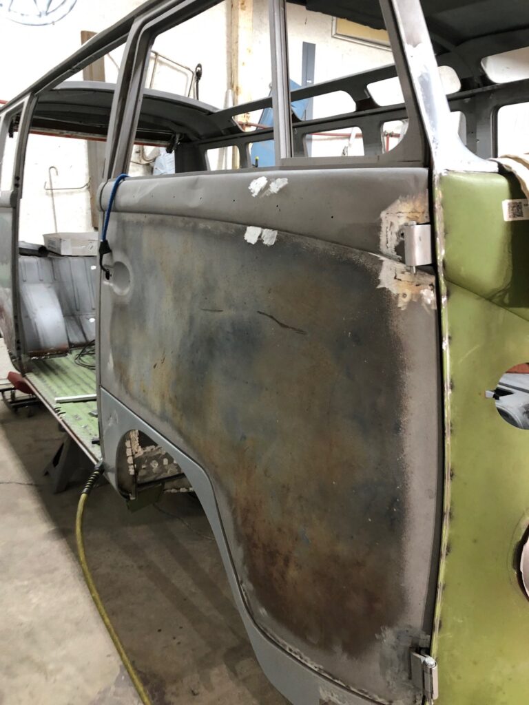 1965 21 window deluxe vw bus front door rust repair silver lining auto restoration oregon