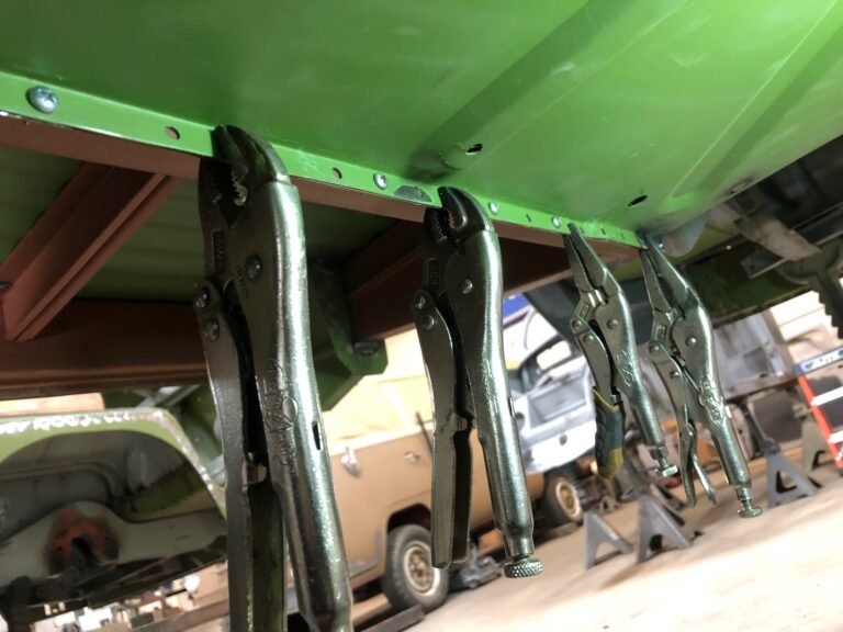 1965 21 window deluxe vw bus main floor and belly pans replacement silver lining auto restoration oregon