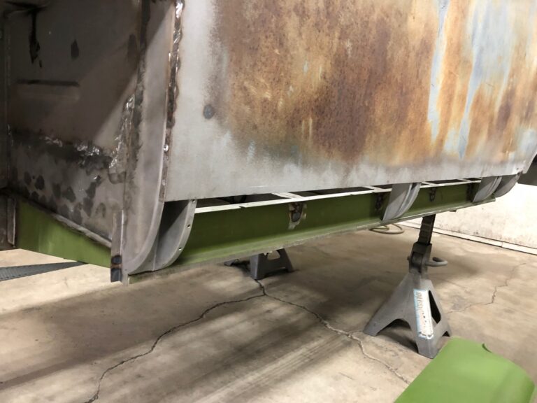 1965 21 window deluxe vw bus main floor and belly pans replacement silver lining auto restoration oregon