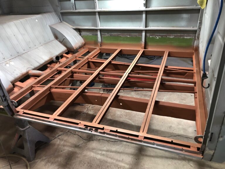 1965 21 window deluxe vw bus main floor and belly pans replacement silver lining auto restoration oregon