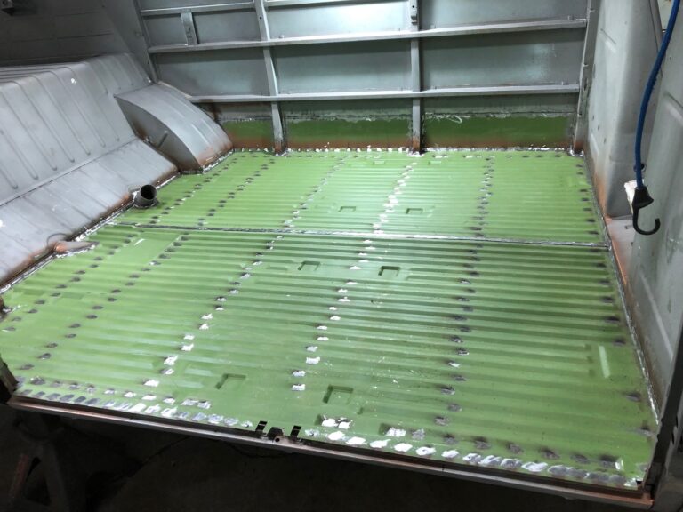 1965 21 window deluxe vw bus main floor and belly pans replacement silver lining auto restoration oregon