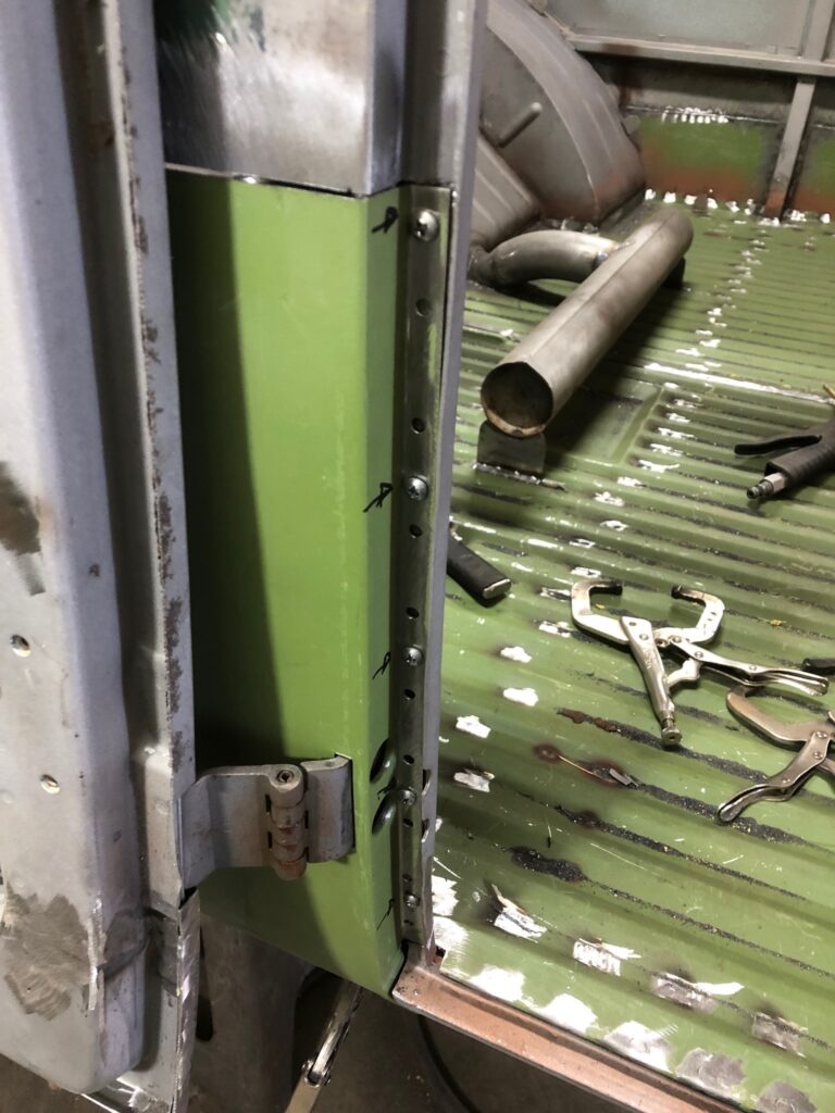 1965 21 window deluxe vw bus wheel well replacement silver lining auto restoration oregon