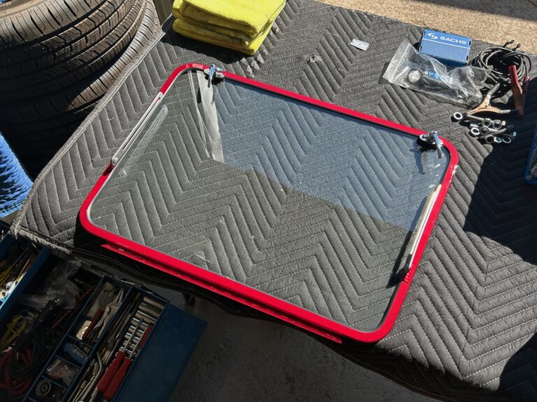 1959 vw panel bus bumpers in paint and safari window install silver lining auto restoration oregon