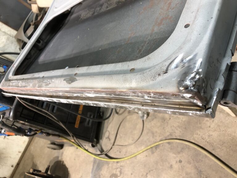 1955 beetle std lower door repair and structure repair silver lining auto restoration oregon