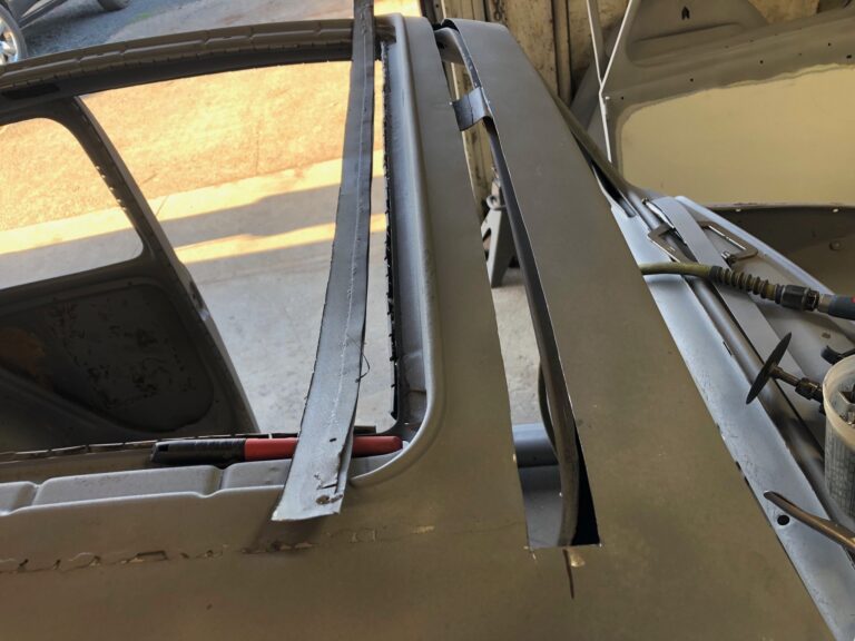 1965 vw ragtop beetle ragtop section repair silver lining auto restoration oregon