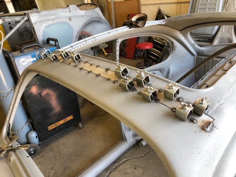 1965 vw ragtop beetle ragtop section repair silver lining auto restoration oregon