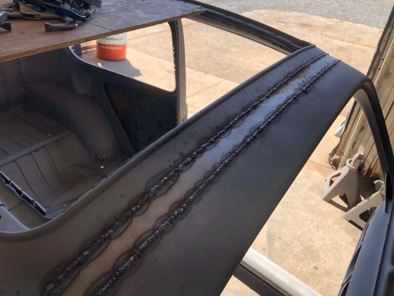 1965 vw ragtop beetle ragtop section repair silver lining auto restoration oregon