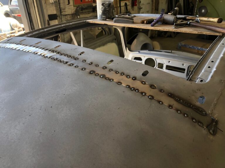 1965 vw ragtop beetle ragtop section repair silver lining auto restoration oregon